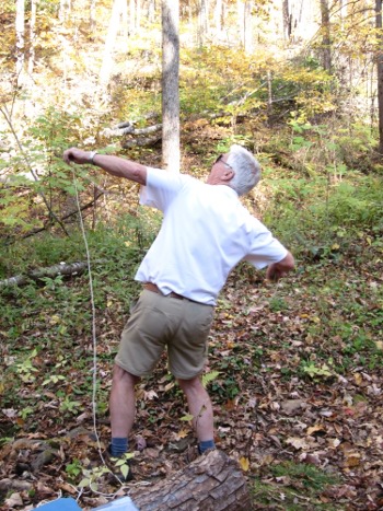 Dad hanging the bear bag