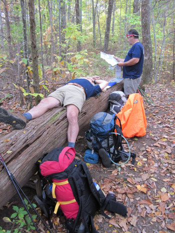 Dad rests while Craig reviews map