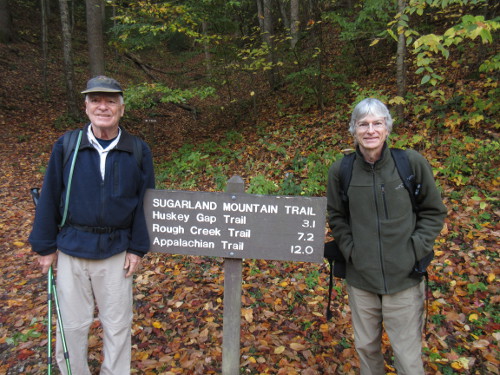 Dad and I pose near a trail intersection