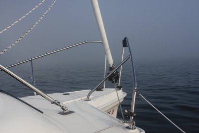 Dense fog off our bow